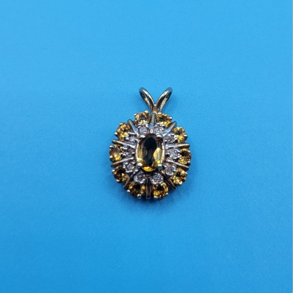 Vintage 10K Yellow gold Small Orange Tanzanite and Diamond Oval Pendant